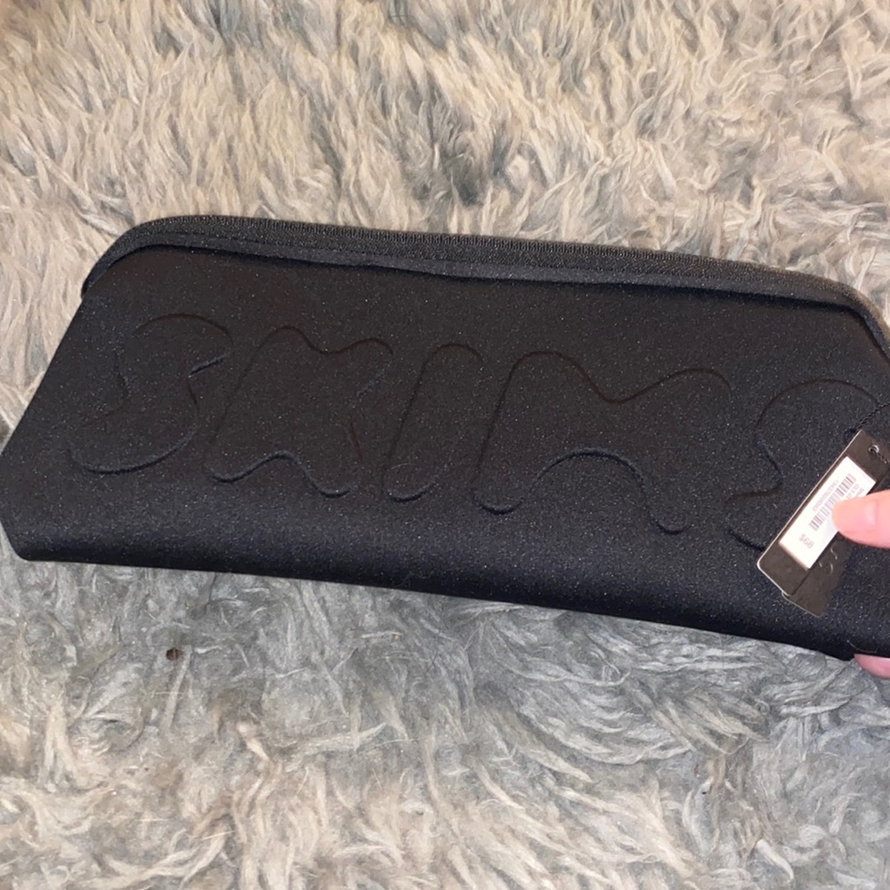 SKIMS black neoprene bag NWT never used!